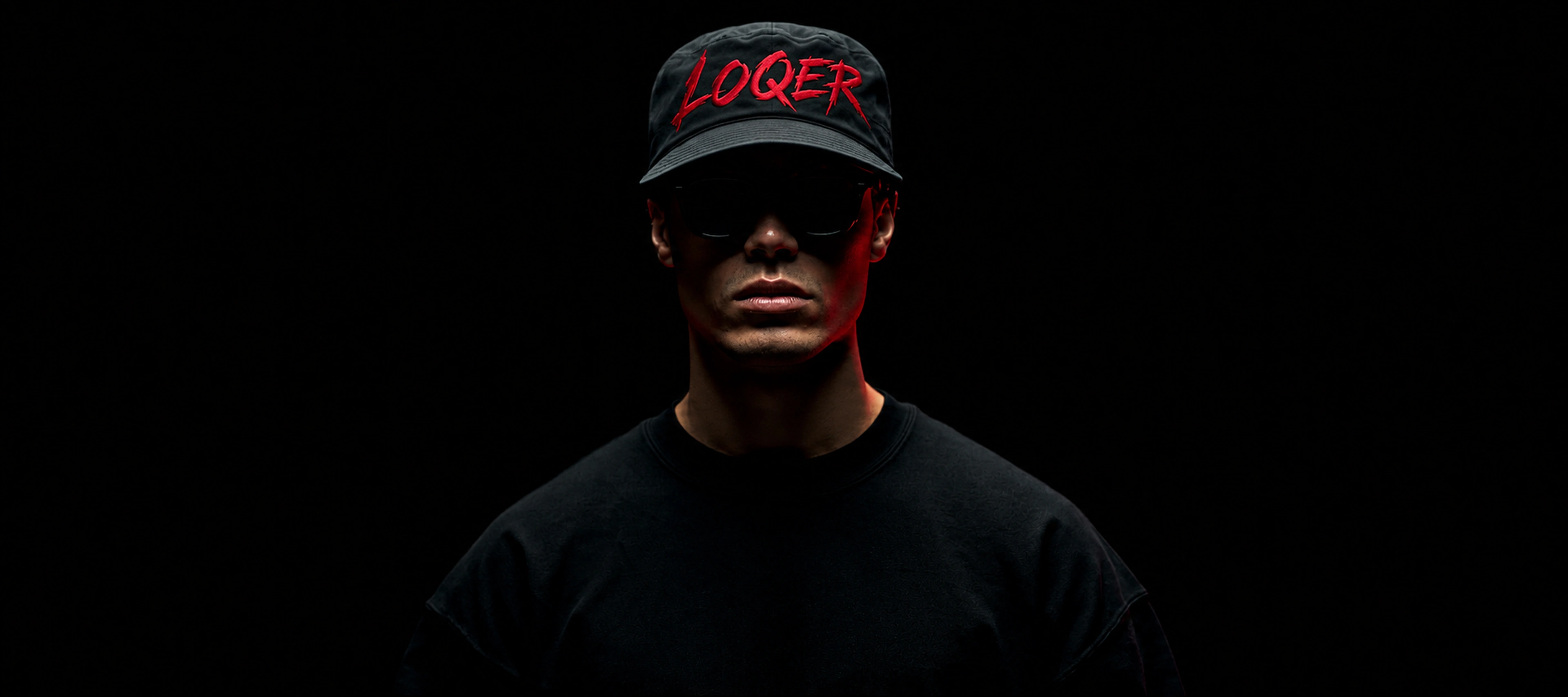 The LOQER character wearing a branded cap against a dark background